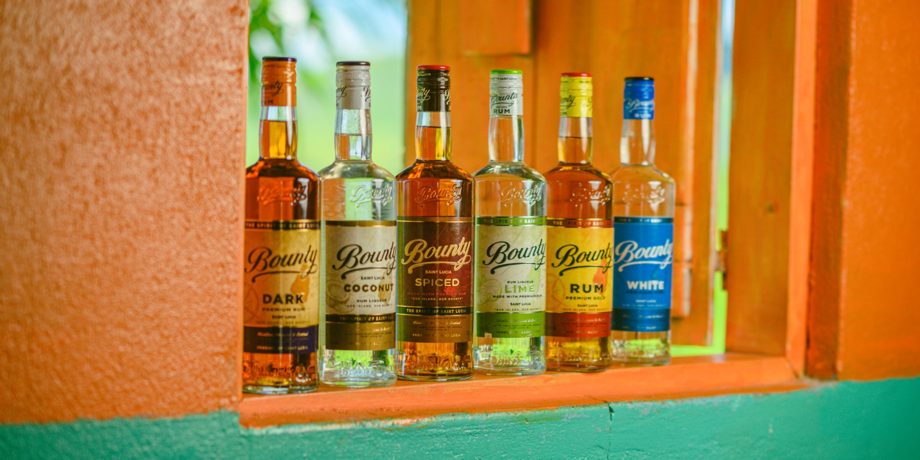 Row of Bounty brand bottles on a colorful background